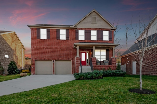 view of front of house with brick siding, a porch, a lawn, driveway, and an attached garage