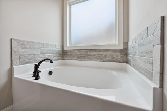 bathroom featuring a bath