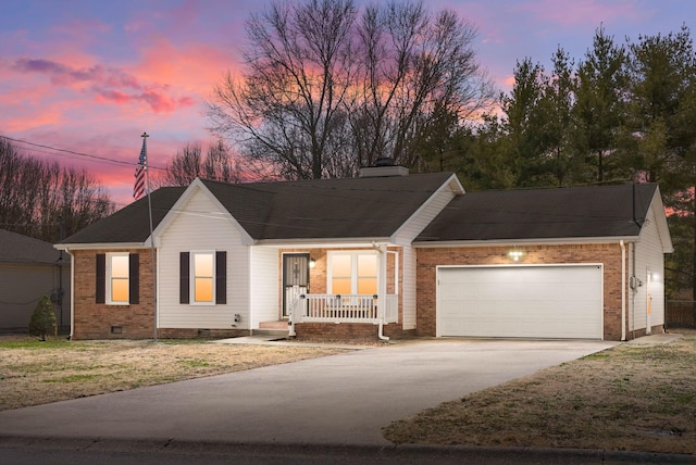 ranch-style home featuring a porch, concrete driveway, a chimney, crawl space, and an attached garage