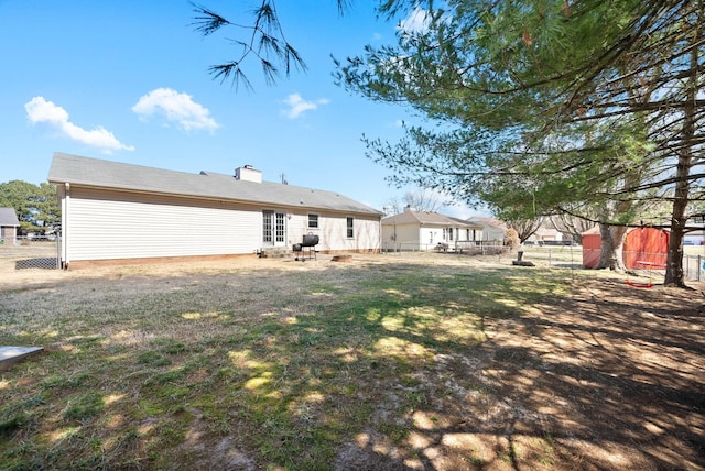 exterior space with a fenced backyard