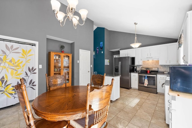 dining room featuring light tile patterned floors, high vaulted ceiling, and a chandelier