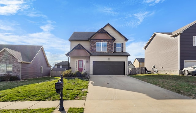 view of front facade with concrete driveway, fence, a garage, and a front yard