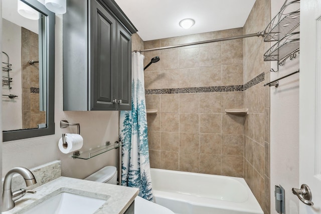 full bath with vanity, toilet, and shower / bath combo with shower curtain