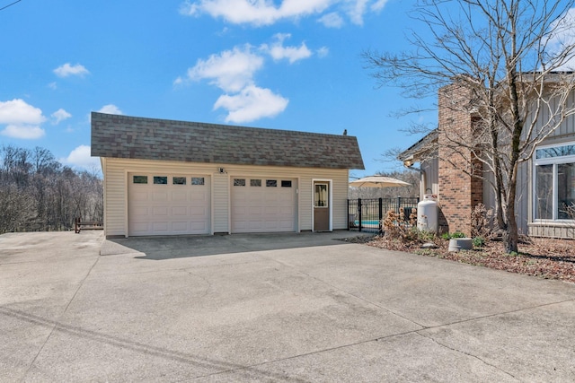 detached garage with fence