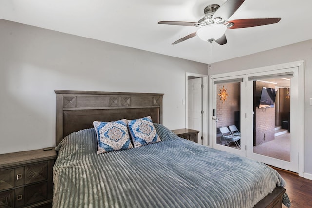 bedroom featuring access to exterior, ceiling fan, and wood finished floors