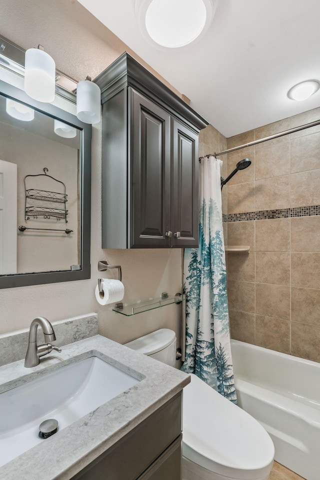 bathroom with vanity, shower / bath combination with curtain, and toilet