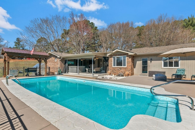 view of pool with a fenced in pool, a patio, and fence