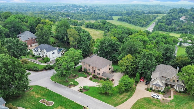 aerial view featuring a view of trees