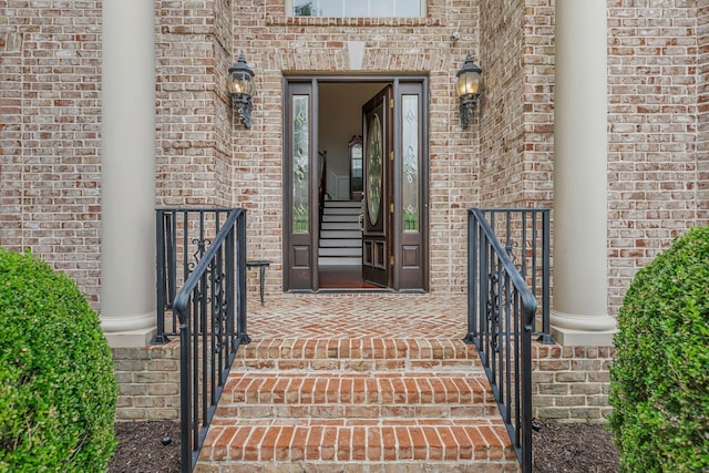 entrance to property with brick siding