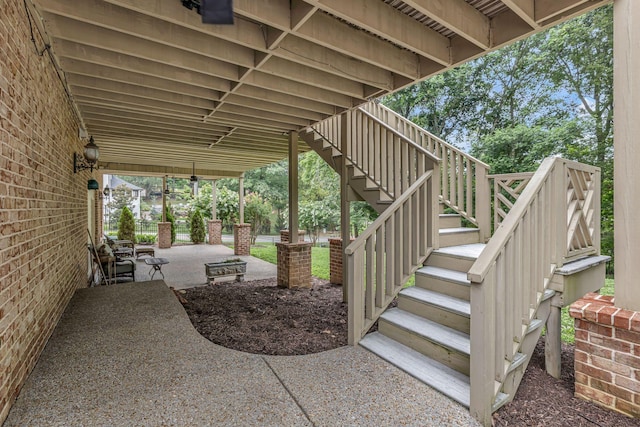 view of patio with stairway