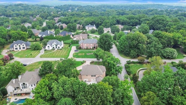 birds eye view of property with a residential view