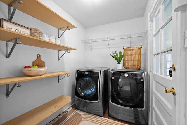 laundry area featuring washer and dryer and laundry area