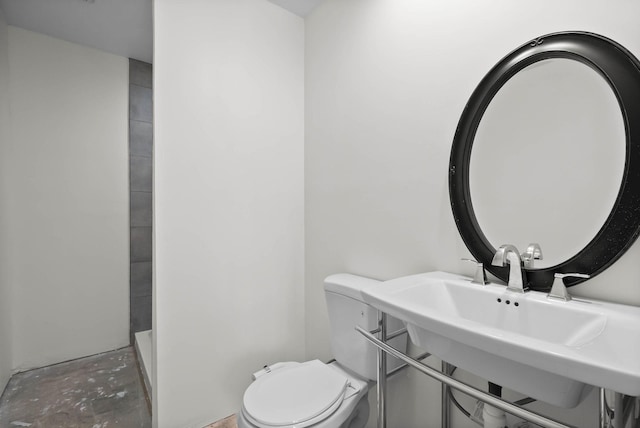 full bath featuring unfinished concrete floors, toilet, and a shower