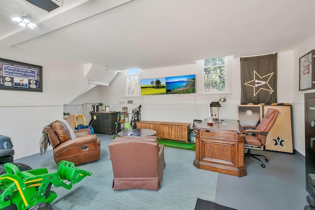 interior space featuring concrete block wall