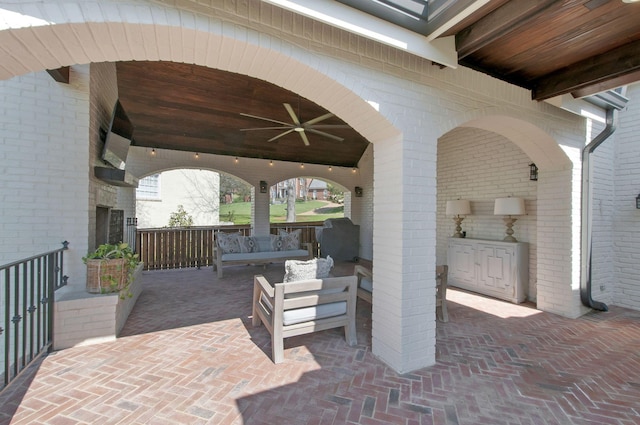 view of patio featuring ceiling fan and outdoor lounge area