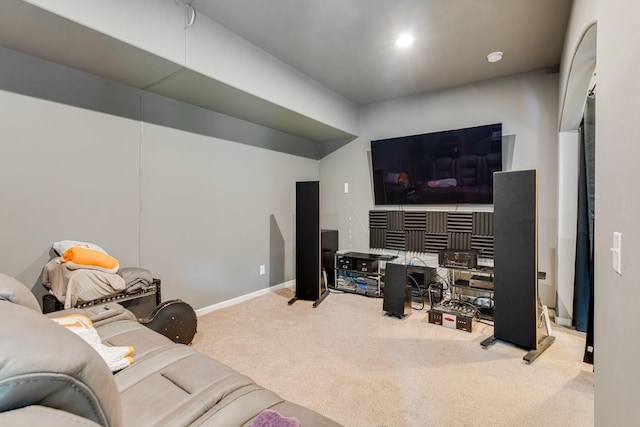 living room with recessed lighting, baseboards, and carpet flooring