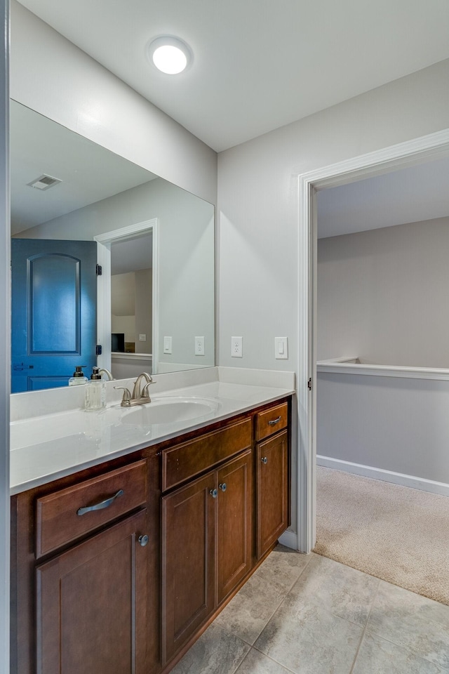 bathroom with visible vents and vanity