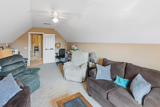 carpeted living area featuring visible vents, lofted ceiling, and ceiling fan