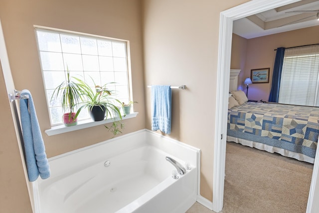 full bathroom featuring plenty of natural light, a garden tub, and ensuite bath