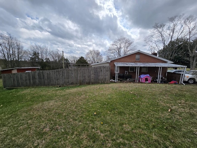 view of yard with fence