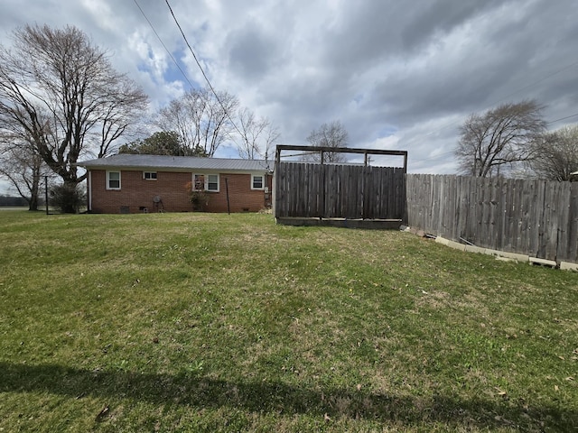 view of yard featuring fence