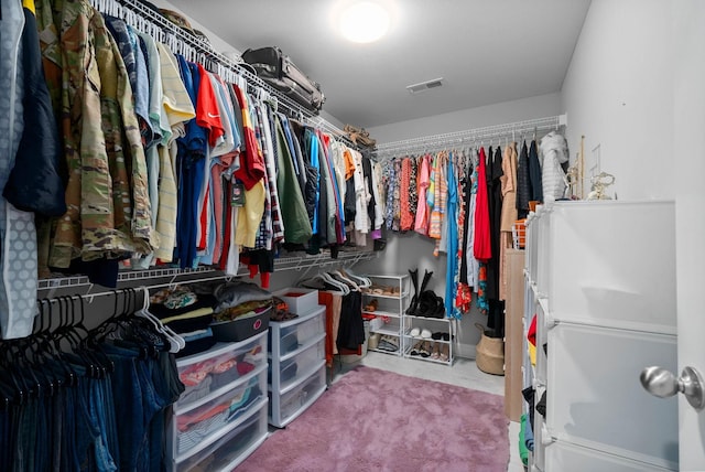 walk in closet with visible vents