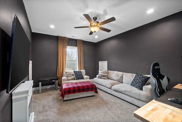 carpeted living area with recessed lighting, visible vents, baseboards, and ceiling fan