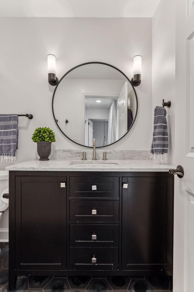 bathroom with vanity and tile patterned flooring