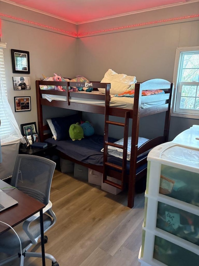 bedroom featuring wood finished floors