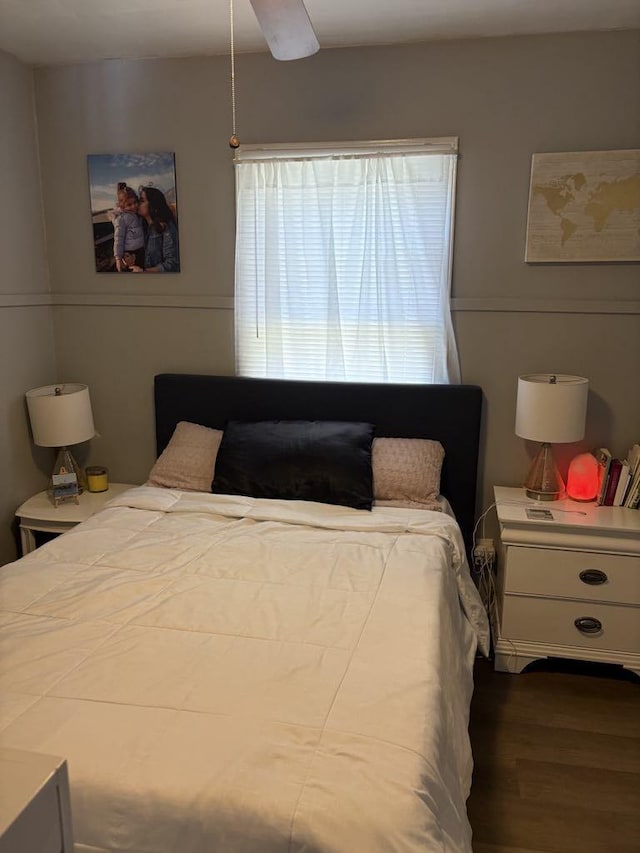 bedroom featuring wood finished floors and ceiling fan