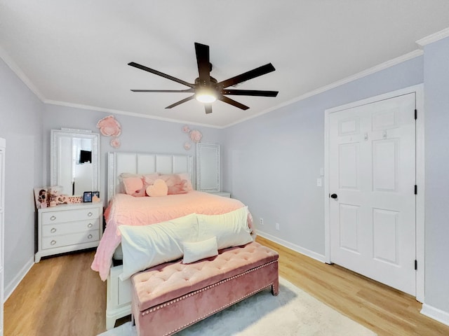 bedroom with ceiling fan, baseboards, light wood-style flooring, and ornamental molding