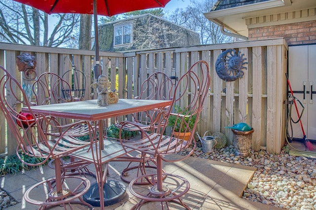 view of patio / terrace with fence