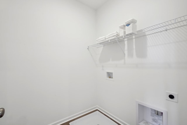 washroom with washer hookup, laundry area, and hookup for an electric dryer