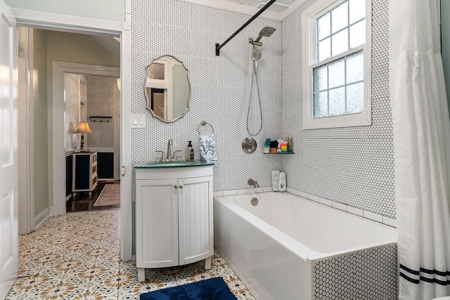 bathroom featuring decorative backsplash, vanity, and shower / bathtub combination with curtain