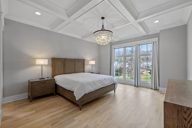 bedroom with baseboards, light wood-type flooring, and coffered ceiling