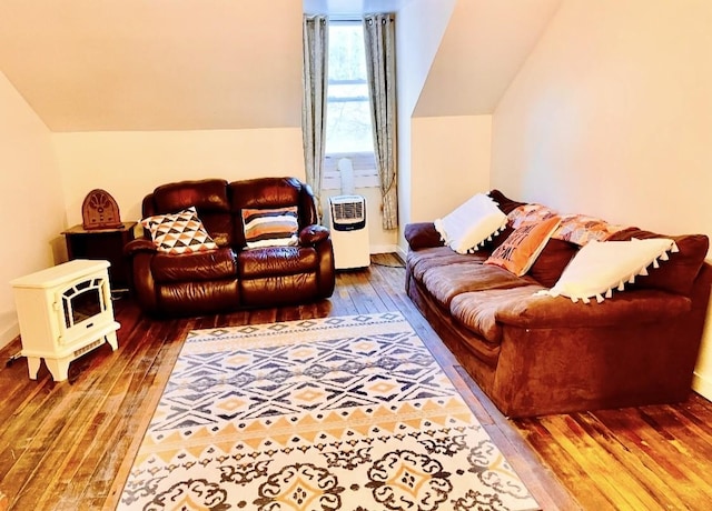 living room featuring wood-type flooring and lofted ceiling