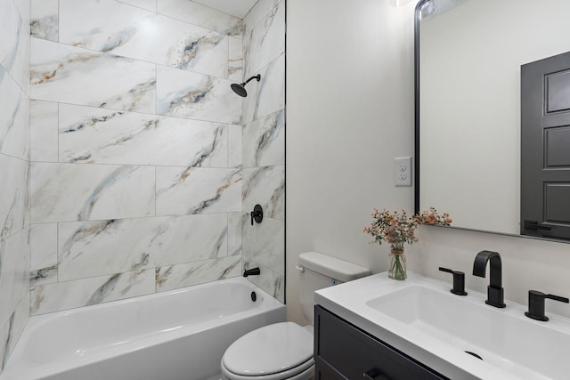 bathroom featuring toilet, vanity, and shower / tub combination