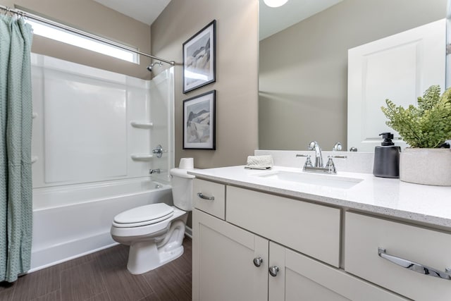 bathroom with vanity, toilet, and shower / bathtub combination with curtain