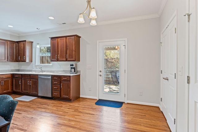 kitchen with dishwasher, light countertops, light wood-type flooring, and ornamental molding