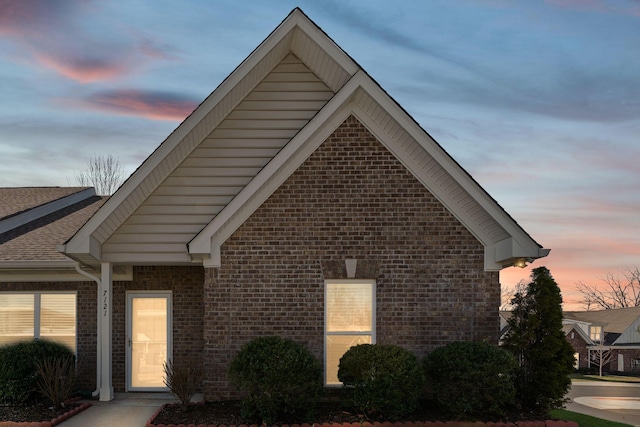 view of front of property with brick siding