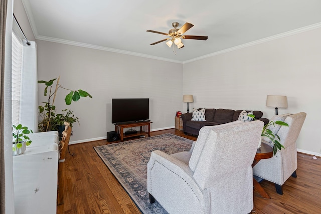 living room with baseboards, wood finished floors, a ceiling fan, and ornamental molding