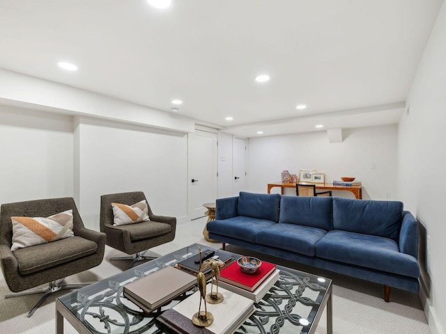 carpeted living area featuring recessed lighting