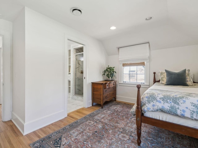 bedroom featuring visible vents, baseboards, lofted ceiling, recessed lighting, and wood finished floors