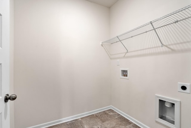 laundry room featuring washer hookup, laundry area, baseboards, and hookup for an electric dryer