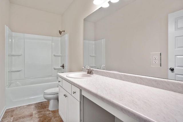 bathroom with toilet,  shower combination, and vanity