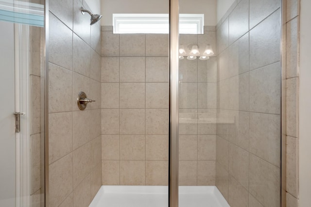 full bath with a shower stall