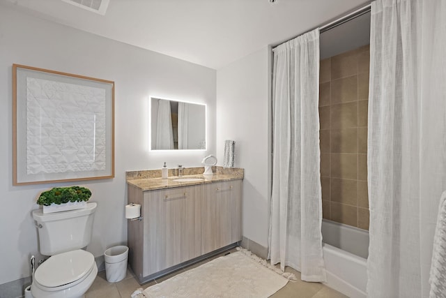 515 Church St Unit 3408, Nashville, TN 37219 - bathroom featuring vanity, baseboards, tile patterned flooring, shower / tub combo, and toilet
