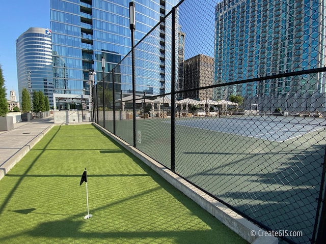515 Church St Unit 3408, Nashville, TN 37219 - view of sport court with a city view and fence