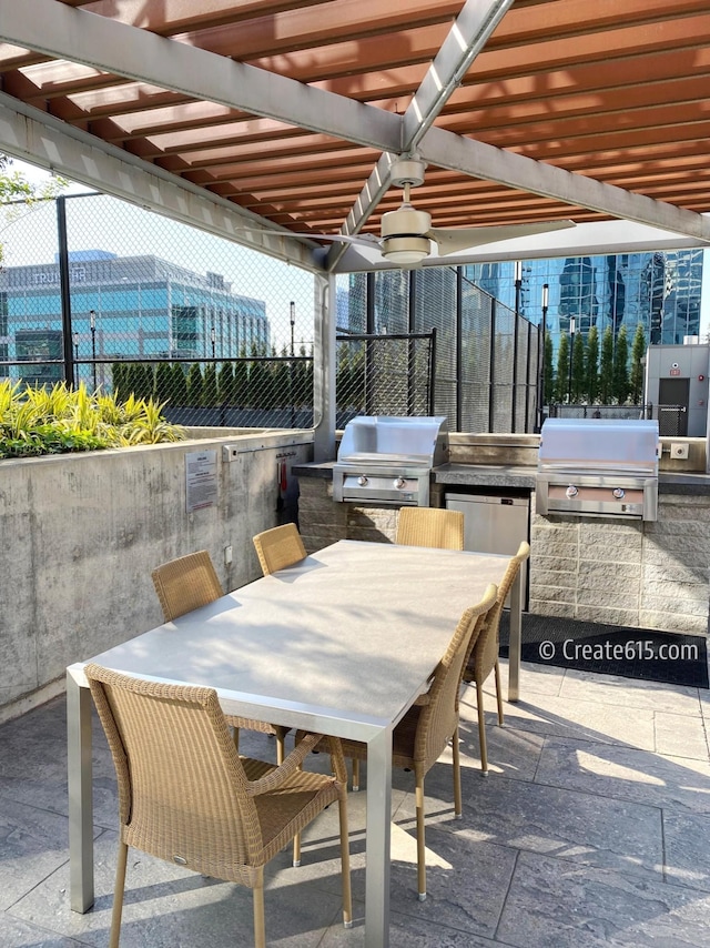 515 Church St Unit 3408, Nashville, TN 37219 - view of patio / terrace featuring outdoor dining area, area for grilling, and fence