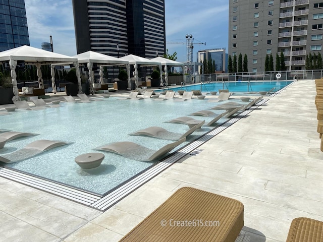 515 Church St Unit 3408, Nashville, TN 37219 - pool featuring a gazebo, a city view, and fence